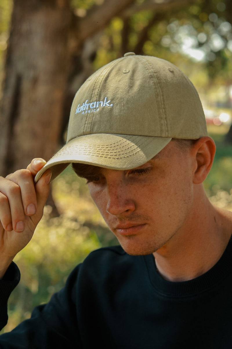 Beige baseball cap on sale