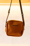 SMALL SQUARE SLING HANDBAG BUTTERNUT