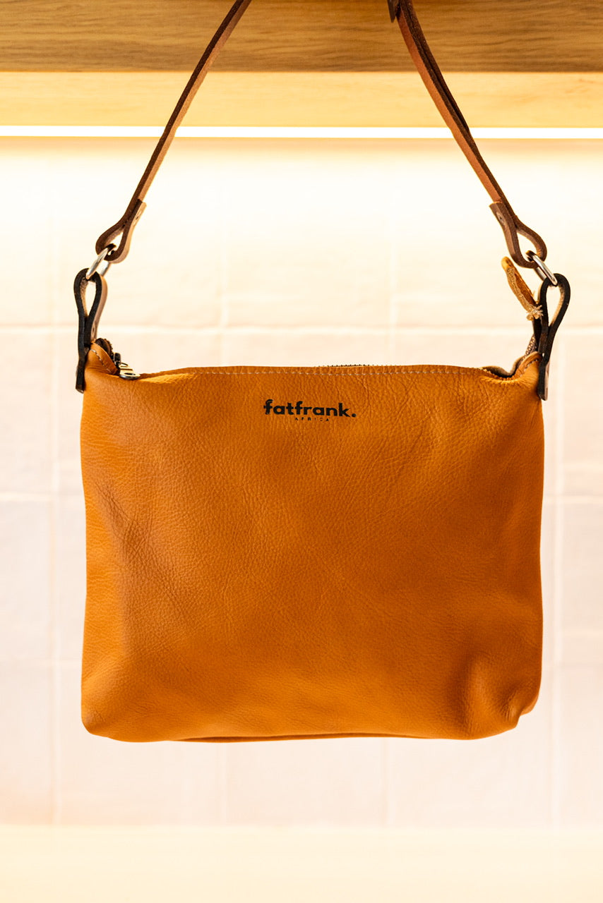LARGE SQUARE SLING HANDBAG BUTTERNUT